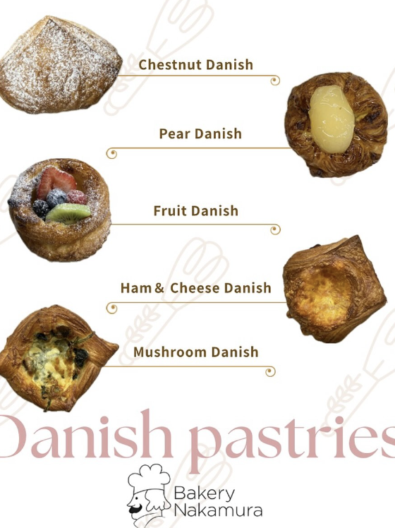 Assorted Danish pastries with fruit, pear, ham and cheese, mushroom, and chestnut